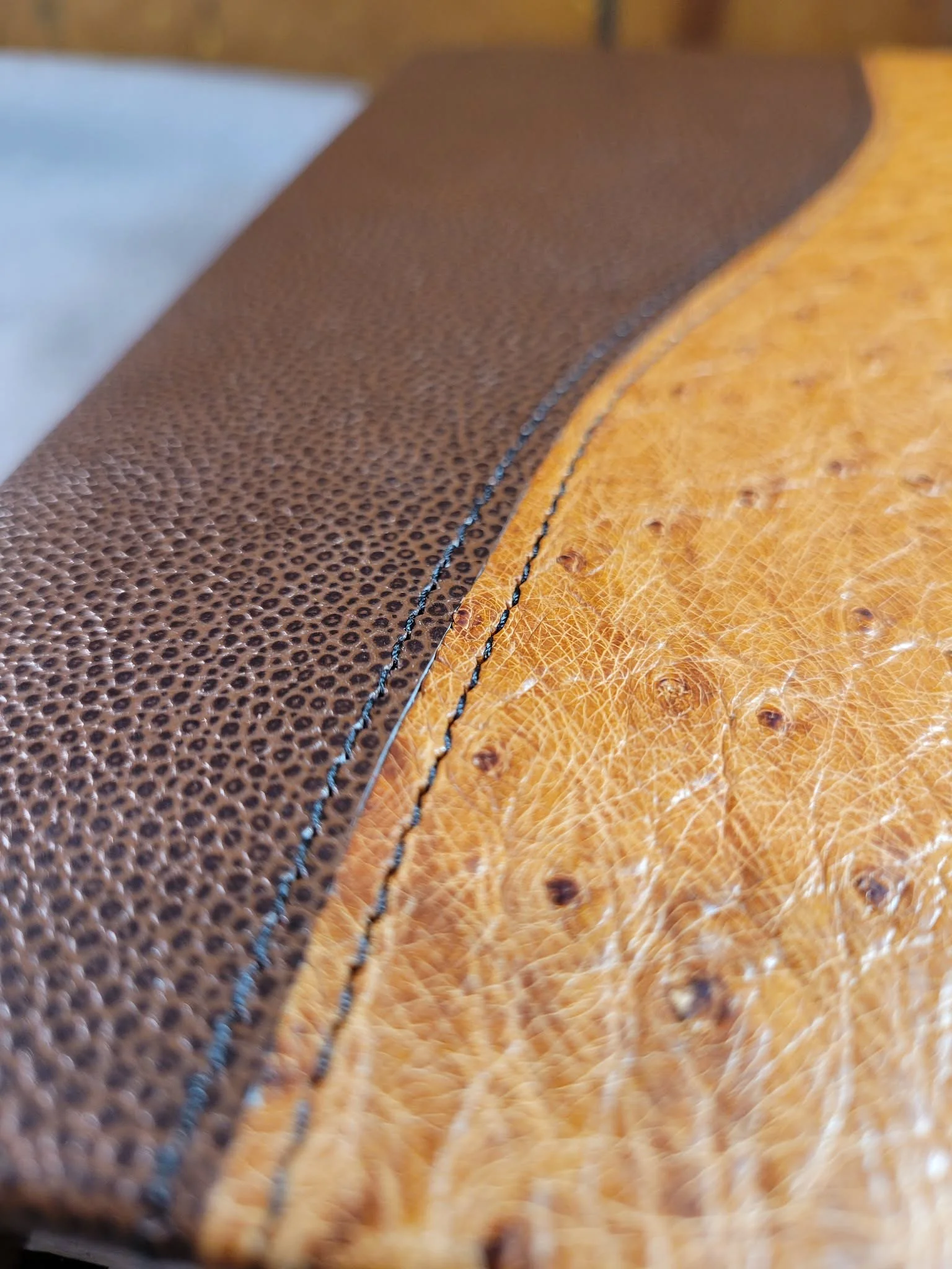 Dual leather covers.